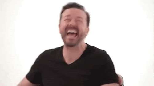 Ricky Gervais Laughing GIF