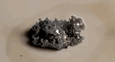 Lithium metal burning. It swells and looks a bit like forbidden cauliflower at one point.